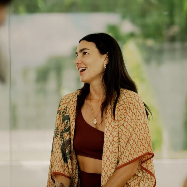 Shannon smiling, wearing a patterned kimono